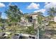 Backyard with patio, garden, and landscaping at 30618 Birdhouse Dr, Wesley Chapel, FL 33545