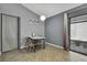 Small dining area with a table and chairs, near sliding glass doors at 30618 Birdhouse Dr, Wesley Chapel, FL 33545