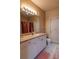 Clean bathroom with a vanity, toilet, and a shower/tub combo at 4221 W Spruce St # 1212, Tampa, FL 33607