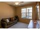 Bedroom with a couch, large window, and plenty of natural light at 4221 W Spruce St # 1212, Tampa, FL 33607