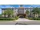 Attractive building exterior with landscaping and parking at 4221 W Spruce St # 1212, Tampa, FL 33607