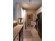 Kitchen with white cabinets, black appliances and laundry area at 4221 W Spruce St # 1212, Tampa, FL 33607