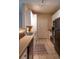 Modern kitchen featuring white cabinets and tile flooring at 4221 W Spruce St # 1212, Tampa, FL 33607