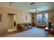 Living room with sofa, TV and cat tree at 4221 W Spruce St # 1212, Tampa, FL 33607