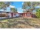 Two-unit house with yard and carport at 5711 S Coolidge Ave, Tampa, FL 33616