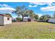 Large backyard with shed and plenty of space for outdoor activities at 5711 S Coolidge Ave, Tampa, FL 33616