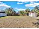 Large backyard with shed and plenty of space for outdoor activities at 5711 S Coolidge Ave, Tampa, FL 33616