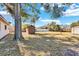 Spacious backyard with two sheds, providing ample storage at 5711 S Coolidge Ave, Tampa, FL 33616