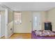 Relaxing bedroom with bay window and dresser at 5711 S Coolidge Ave, Tampa, FL 33616