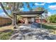 Carport and sitting area next to house at 5711 S Coolidge Ave, Tampa, FL 33616