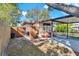 Side view of house with carport and fence at 5711 S Coolidge Ave, Tampa, FL 33616