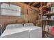 Basement laundry room with washer, dryer, and storage at 5711 S Coolidge Ave, Tampa, FL 33616