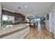 Modern kitchen with granite countertops and dark cabinets at 6516 Salt Creek Ave, Apollo Beach, FL 33572