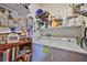 Laundry room with washer, dryer, and shelving at 6516 Salt Creek Ave, Apollo Beach, FL 33572
