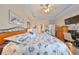 Spacious main bedroom with a king-size bed and ensuite bathroom at 6516 Salt Creek Ave, Apollo Beach, FL 33572
