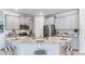 Modern kitchen with granite countertops and stainless steel appliances at 688 157Th E Ct, Bradenton, FL 34212