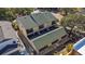 Aerial view of a three-unit townhome building and garage at 835 7Th N Ave, St Petersburg, FL 33701