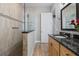 Bathroom with walk-in shower and granite vanity at 835 7Th N Ave, St Petersburg, FL 33701