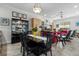 Bright dining area with a table and chairs, open to living room at 835 7Th N Ave, St Petersburg, FL 33701