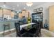Kitchen with a dining area and black table with six chairs at 835 7Th N Ave, St Petersburg, FL 33701