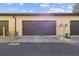 Attached garage with dark brown door, unit number 835 at 835 7Th N Ave, St Petersburg, FL 33701