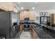 Modern kitchen with stainless steel appliances and granite countertops at 835 7Th N Ave, St Petersburg, FL 33701