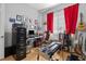 Bright room with a computer, pedal steel guitar, and musical instruments at 835 7Th N Ave, St Petersburg, FL 33701