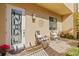 Private patio with seating and access to the front door at 835 7Th N Ave, St Petersburg, FL 33701
