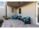 Cozy patio with teal wicker furniture and brick pavers at 835 7Th N Ave, St Petersburg, FL 33701