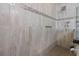 Walk-in shower with grab bar and mosaic tile at 835 7Th N Ave, St Petersburg, FL 33701