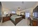 Spacious main bedroom with a king-size bed and ensuite bathroom at 1001 Starkey Rd # 398, Largo, FL 33771