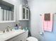 Bathroom with vanity, toilet, and medicine cabinet at 10842 Lake Saint Charles Blvd, Riverview, FL 33578