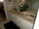 Double vanity bathroom with tiled floor at 12172 Wild Acres Rd, Largo, FL 33773
