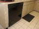 Black built-in dishwasher in kitchen at 12172 Wild Acres Rd, Largo, FL 33773