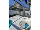 Screened pool area with patio furniture at 12172 Wild Acres Rd, Largo, FL 33773
