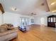 Living room with hardwood floors and french doors leading outside at 12233 Bartkus Ct, Hudson, FL 34669