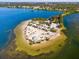 Aerial view of waterfront park with beach at 1614 Sea Breeze Dr, Tarpon Springs, FL 34689
