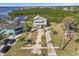 Two-story waterfront home with spacious lot and detached garage at 1614 Sea Breeze Dr, Tarpon Springs, FL 34689