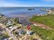 Aerial view showcasing waterfront property at 1614 Sea Breeze Dr, Tarpon Springs, FL 34689