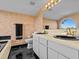 Bathroom boasts a double vanity and updated fixtures at 1614 Sea Breeze Dr, Tarpon Springs, FL 34689