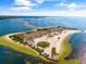 Aerial view of a beautiful beach and island at 1614 Sea Breeze Dr, Tarpon Springs, FL 34689
