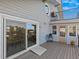 Spacious deck with access ramp, offering scenic views and a relaxing outdoor space at 1614 Sea Breeze Dr, Tarpon Springs, FL 34689
