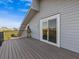 Deck with sliding glass doors and a view at 1614 Sea Breeze Dr, Tarpon Springs, FL 34689