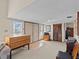 Bright and spacious entryway with tiled floors and wooden furniture at 1614 Sea Breeze Dr, Tarpon Springs, FL 34689