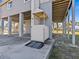 Home features an exterior elevator for accessibility at 1614 Sea Breeze Dr, Tarpon Springs, FL 34689