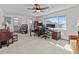 Spacious home office with hardwood floors and two work stations at 1614 Sea Breeze Dr, Tarpon Springs, FL 34689