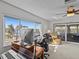 Bright home office features water views, built-in desk, and comfortable seating at 1614 Sea Breeze Dr, Tarpon Springs, FL 34689