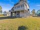 Elevated home with large deck and waterfront access at 1614 Sea Breeze Dr, Tarpon Springs, FL 34689