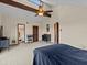 Main bedroom with ensuite bath and walk-in closet at 1614 Sea Breeze Dr, Tarpon Springs, FL 34689