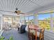 Bright sunroom with water views and plenty of natural light at 1614 Sea Breeze Dr, Tarpon Springs, FL 34689